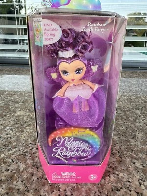 Hada de los dientes del arco iris Fairytopia Magic of the Rainbow Barbie púrpura Foto 1 de 4