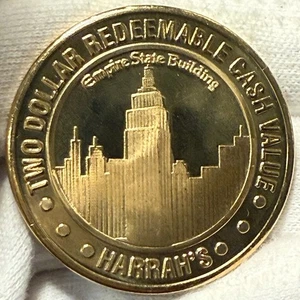 1996 Harrah’s Reno Nevada $2 Redeemable Token ~ Empire State Building (L335) - Picture 1 of 3