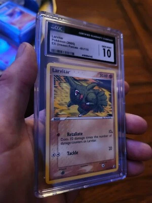 (TOP POP 10) CGC 10 GEM MINY 2005 Pokemon EX Unseen Forces Larvitar 61/115 Card - Image 1 of 4
