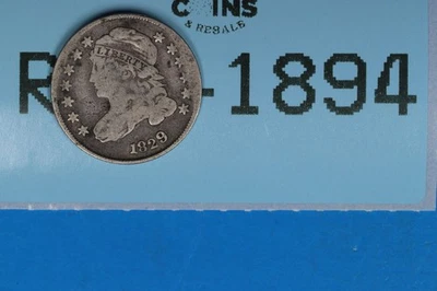 СЕРЕБРЯНАЯ МОНЕТА НОМИНАЛОМ 10 ЦЕНТОВ 1829 С ИЗОБРАЖЕНИЕМ СВОБОДЫ С КРЫШКОЙ БЮСТА раннего типа США RAW-1894 - Изображение 1 из 2