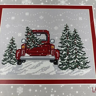 Sue Hillis Designs Cross Stitch Pattern Bringing Home the Tree Red Truck Holiday - Image 1 of 3