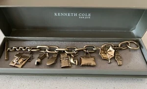 KENNETH COLE Gold Tone Toggle BRACELET with 8 Designer CHARMS - Picture 1 of 24