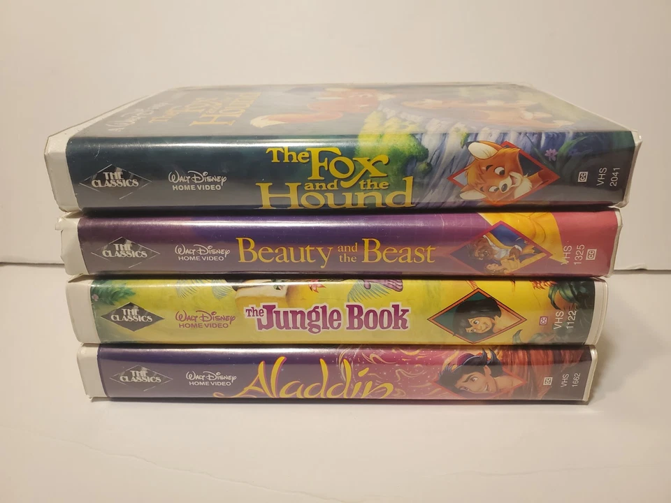 Lot of 4 VHS Disney Classic Black Diamond Jungle Book, Aladdin, Beauty & Beast - Image 1 of 2