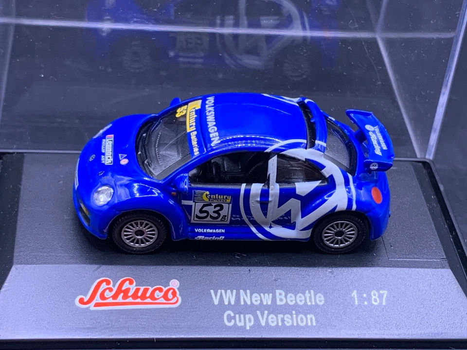 Schuco Modellbau Auto 1:87 H0 VW New Beetle Cup versione blu Lennock - Immagine 1 di 1