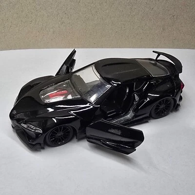 Jada Toys Toyota FT-1 Concept Car Negro 1:32 Diecast - Puertas de apertura - Coche JDM Foto 1 de 4