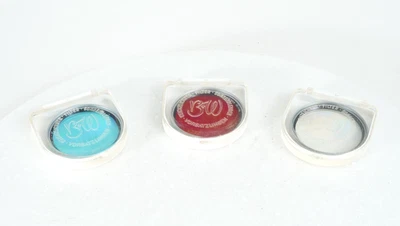 -[EX+] SET OF 3 49MM B+W FILTERS/RED 8X, BLUE 3X. CLEAR 1X- WITH CASES - Image 1 of 2