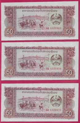 LAOS 50 KIP 1979 UNC LOT OF 7 UNEVEN CUT,REPLACEMENT NOTE,RICE PLANTING AT LEFT  - Image 1 of 4