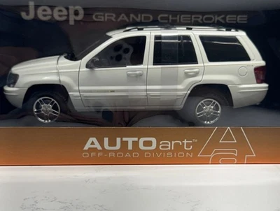 1:18 AUTOart Jeep Grand Cherokee 1999 (blanco) 74011 nuevo en caja Foto 1 de 4