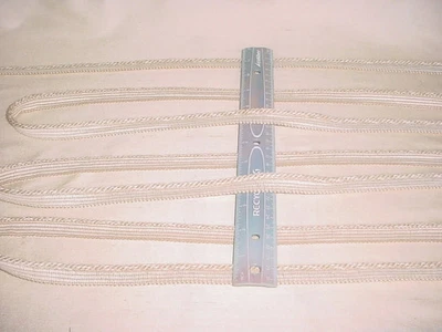 18Y CONSO PERGAMINO / CORDÓN BLANCO PLATEADO CON CORTINAS LABIALES TAPICERÍA RIBETE Foto 1 de 3