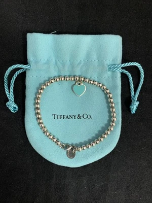 Pulsera Tiffany & Co. Corazón Azul Etiqueta Cuentas 6 7/8" Foto 1 de 4