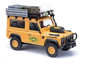 Busch 54311 - H0 - Land Rover Defender 90 Camel Trophy 1985, Deutschland - Neu - Picture 1 of 1