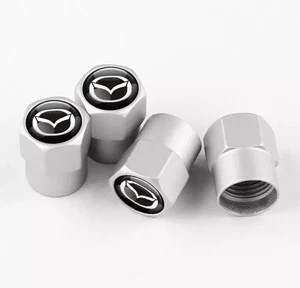 MAZDA 4x Silver Tyre Valve Dust Caps BRAND NEW - Picture 1 of 3