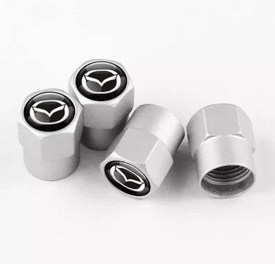 MAZDA 4x Silver Tyre Valve Dust Caps BRAND NEW - Image 1 of 3