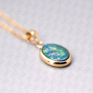 Colgante y collar de ópalo doblete australiano natural ovalado de oro amarillo de 14 k - Imagen 1 de 5