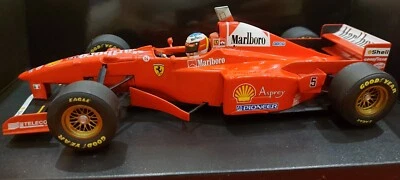 F1 Ferrari F310B 1997 Michael Schumacher 1:18 Minichamps - Image 1 of 4