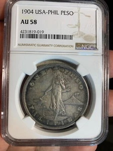 US PHILIPPINES ONE PESO 1904-P NGC AU 58 NICE TONING - Picture 1 of 4