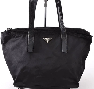 Auténtico bolso de mano con placa con logotipo triangular PRADA negro usado 10K7060 Foto 1 de 4