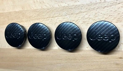 Juego de 4 tapas centrales de rueda de fibra de carbono negras originales OEM 2 1/8" para Jeep Wrangler Foto 1 de 4