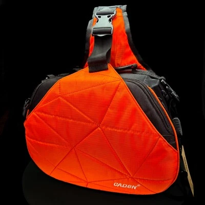 Bolso Bandolera Caden Naranja Negro Cámara Correas Ajustables Trípode Lazos Eslinga Foto 1 de 4
