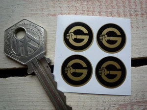 GIRLING Shock Absorber STICKERS Set of 4 Small 18mm Black Gold Car Motorcycle - Picture 1 of 1