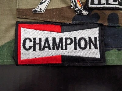 Champion Patch Motorsports Cars Racing Plugs Embroidered Iron On Patch 2"x3.75" - Image 1 of 4