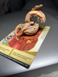 BAKUGAN NAGA DRAGONOID B2 BRONCEADO SUBTERRA 450g BATTLE BRAWLERS CON TARJETA - Imagen 1 de 6
