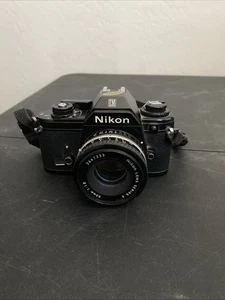 Nikon EM analoge 35-mm-Spiegelreflexkamera manuell mit Objektiv 50 mm Series E - Bild 1 von 8