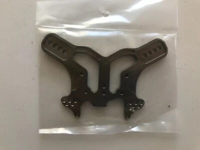 Torre de amortiguador trasero Losi 8B - marca desconocida del mercado de accesorios - Es muy gruesa  Foto 1 de 2