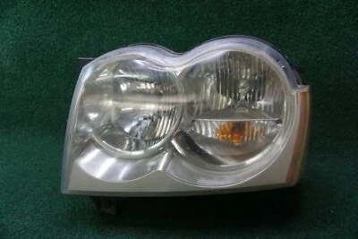 Luz principal izquierda Jeep Grand Cherokee 2005 2006 2007 OEM 55156351AI Foto 1 de 4