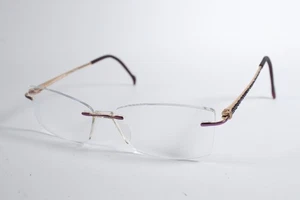 Stepper Eyeglasses SI-94945 Womens Purple/Gold F088 Rimless Titanium Frames - Picture 1 of 4