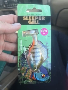 Megabass Sleeper Gill 3,2" 3/4oz Glitter Wild Gill Paddletail Snagless Swimbait - Bild 1 von 1