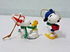 Vintage Lot of 2 Peanuts Snoopy Figure Holding Gift & WOODSTOCK Shoveling Snow 