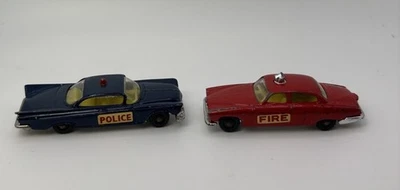 Coche de policía Husky Buick Electra azul de colección años 60 y Jaguar de bomberos rojo diecast Gran Bretaña Foto 1 de 4