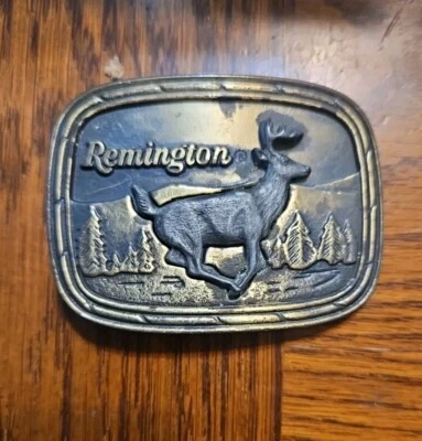 DE COLECCIÓN 1979 **REMINGTON** CIERVO COLA BLANCA CAMPANA LATERAL ARTE CINTURÓN HEBILLA CAZA Foto 1 de 4