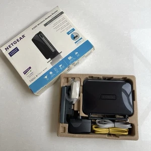 Routeur modem sans fil ADSL2+ Netgear N300 DGN2200 - Photo 1/12