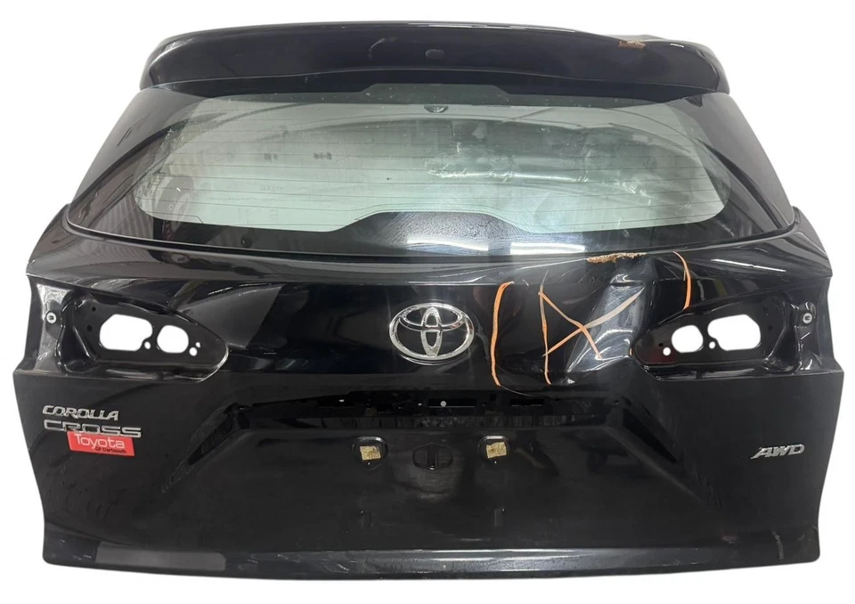 Toyota Corolla 2022-2024 tapa maletero cruzado puerta trasera negro OEM Foto 1 de 4