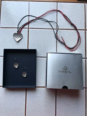 BREIL TRIBE PARURE COLLANA + ORECCHINI ACCIAIO CON SCATOLA come nuovi - Immagine 1 di 3