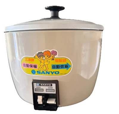 SANYO Arrocera Vaporera Modelo EC 13 Eléctrica 240 Voltios Funcionamiento Sencillo 600W Foto 1 de 4