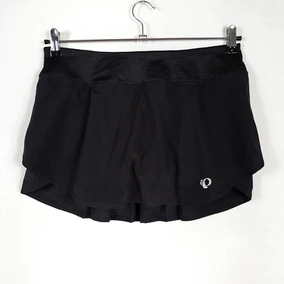 Falda Pearl Izumi para mujer mediana negra forrada de ciclismo plisada bolsillo trasero con cremallera Foto 1 de 4