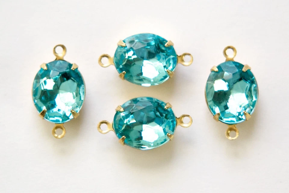 Piedras de vidrio ovaladas facetadas azul aguamarina en 2 bucles ajuste de latón ovl011L2 Foto 1 de 1