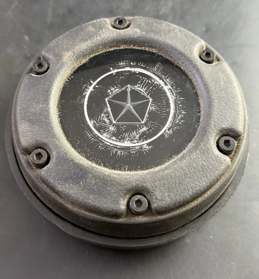 CARGADOR DODGE RAM VOLANTE DEPORTIVO BOCINA BOTÓN TAPA PESTAÑAS ROTAS VC4 Foto 1 de 4