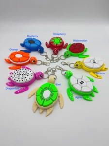 Turtle Fruit Fidget Clicker - 8 Frutas Únicas | Figura Sensorial Tamaño Llavero - Imagen 1 de 65