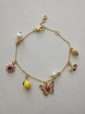 Kate Spade New York glazed butterfly lemon flower pendant Bracelet - Image 1 of 3