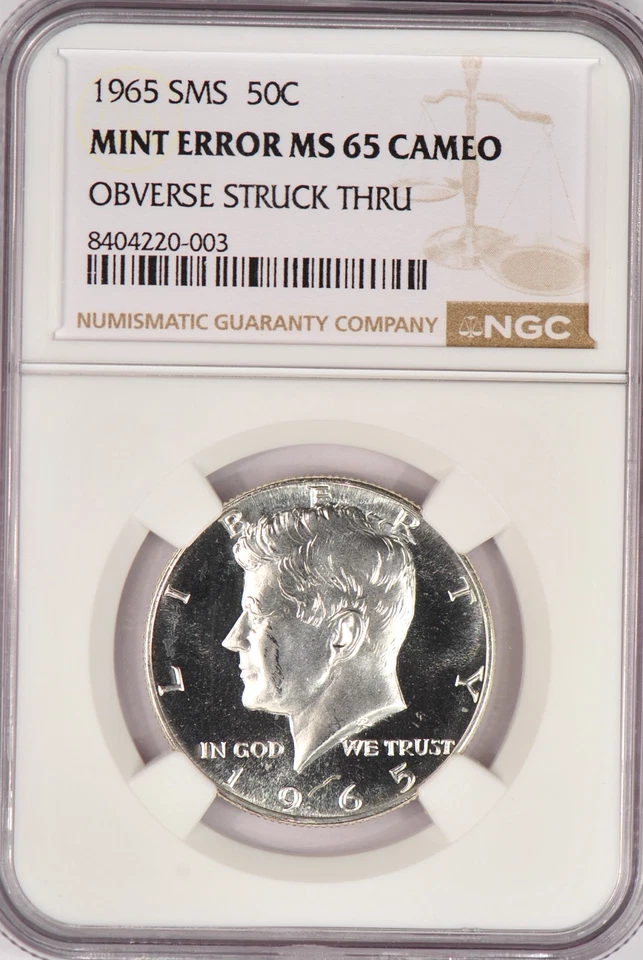 1965 SMS Kennedy Half Dollar NGC MS 65 CAMEO Struck Thru Mint Error 50C - Image 1 of 3