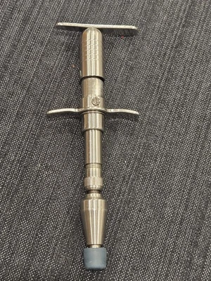 Herramienta de instrumento de ajuste activador genuino y ajuste quiropráctico Foto 1 de 4