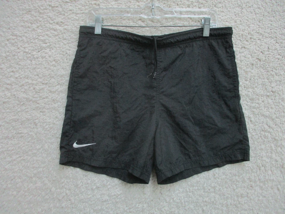 VINTAGE Pantalones Cortos Nike Medianos Juveniles Negros Pantalones Cortos Atléticos Nylon Swoosh Gimnasio Niños M Foto 1 de 4
