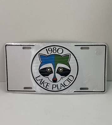 Etiqueta de matrícula olímpica de invierno 1980 Lake Placid XIII Roni Racoon de colección nueva en stock Foto 1 de 4