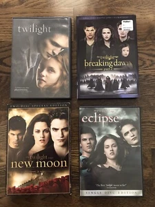 TWILIGHT SAGA MOVIES DVD LOT OF 4 NEW MOON ECLIPSE BREAKING DAWN 2 AND TWILIGHT - Picture 1 of 4
