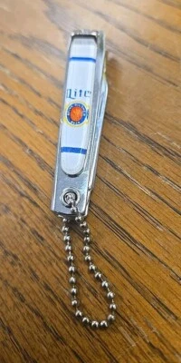 Cuchillo de bolsillo Miller Lite Beer BELL llavero cortaúñas de dedo (SR1) Foto 1 de 4