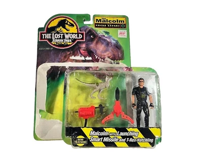 Juguete de dinosaurio Parque Jurásico Malcolm con misil y Trex Kenner + caja RARO 1996 Foto 1 de 4